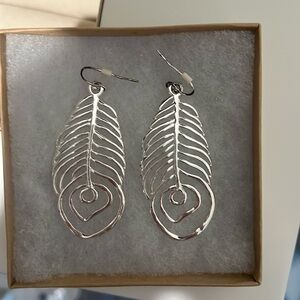 never before worn palm leaf dangly earrings